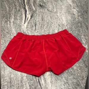 Size 14 dark red Lululemon hottie hot shorts low rise 2.5” inseam. Like new